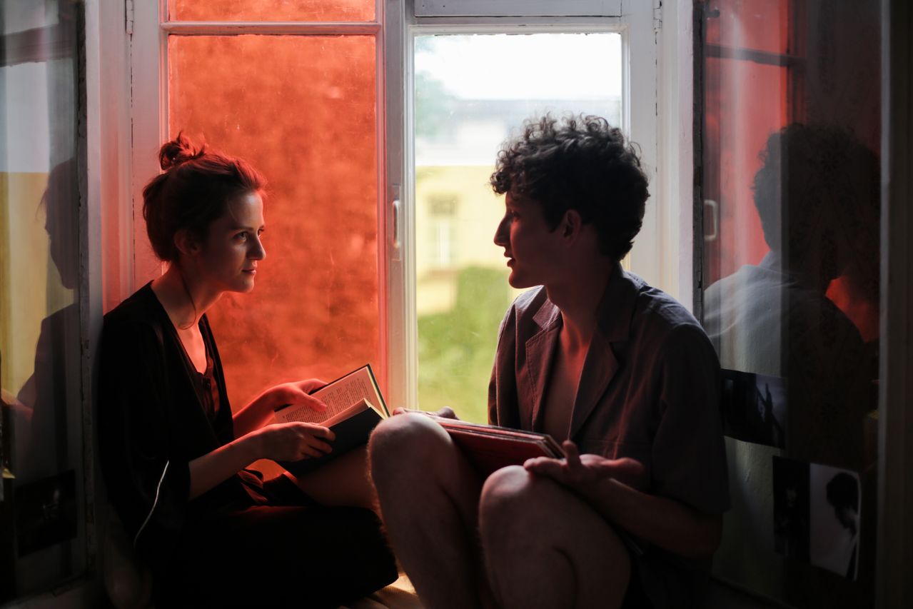 man-and-woman-sitting-on-couch